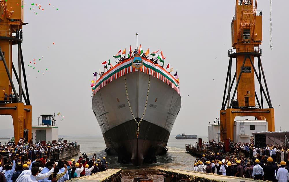 The Indian Navy’s newly built warship INS Visakhapatnam sails into the Arabian Sea during its launch at Mazagon Dock in Mumbai. At 7,300 tonnes, Visakhapatnam will be the largest destroyer commissioned by the Indian Navy and will be equipped with the Israeli Multi Function Surveillance Threat Alert Radar (MF-STAR) which will provide targeting information to 32 Barak 8 long-range surface to air missiles onboard the warship.