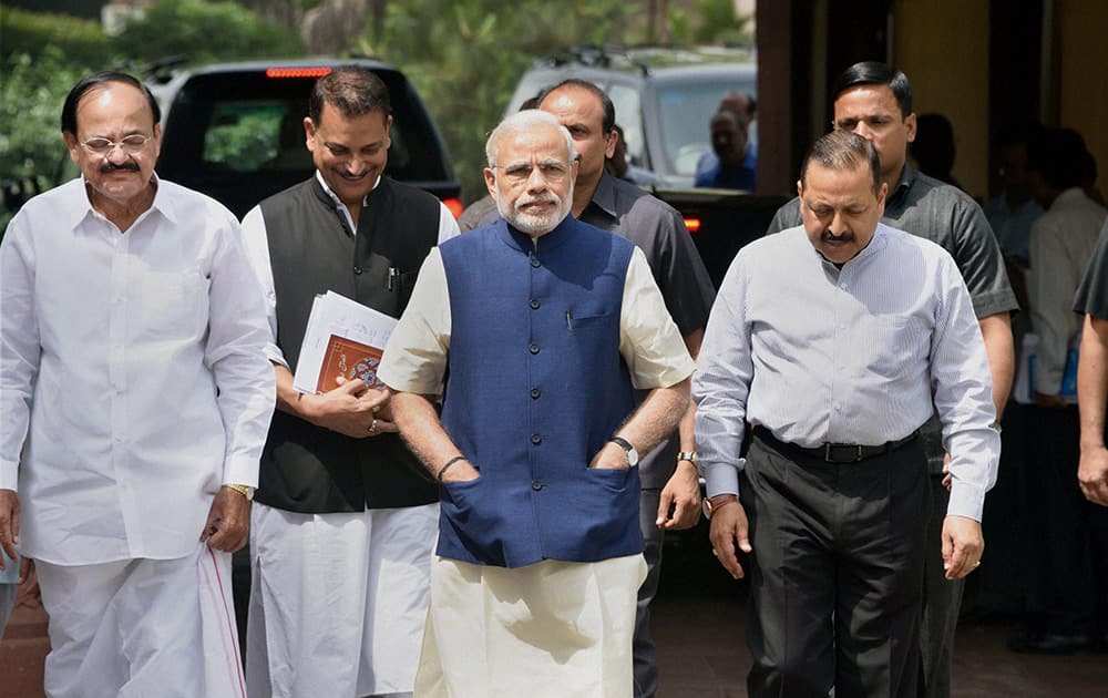Prime Minister Narendra Modi with Union Parliamentary Affairs Minister Venkaiah Naidu, MoS Mukhtar Abbas Naqvi, MoS Rajiv Pratap Rudy and MoS Jitendra Singh on the first day of the second part of the Budget session in New Delhi.