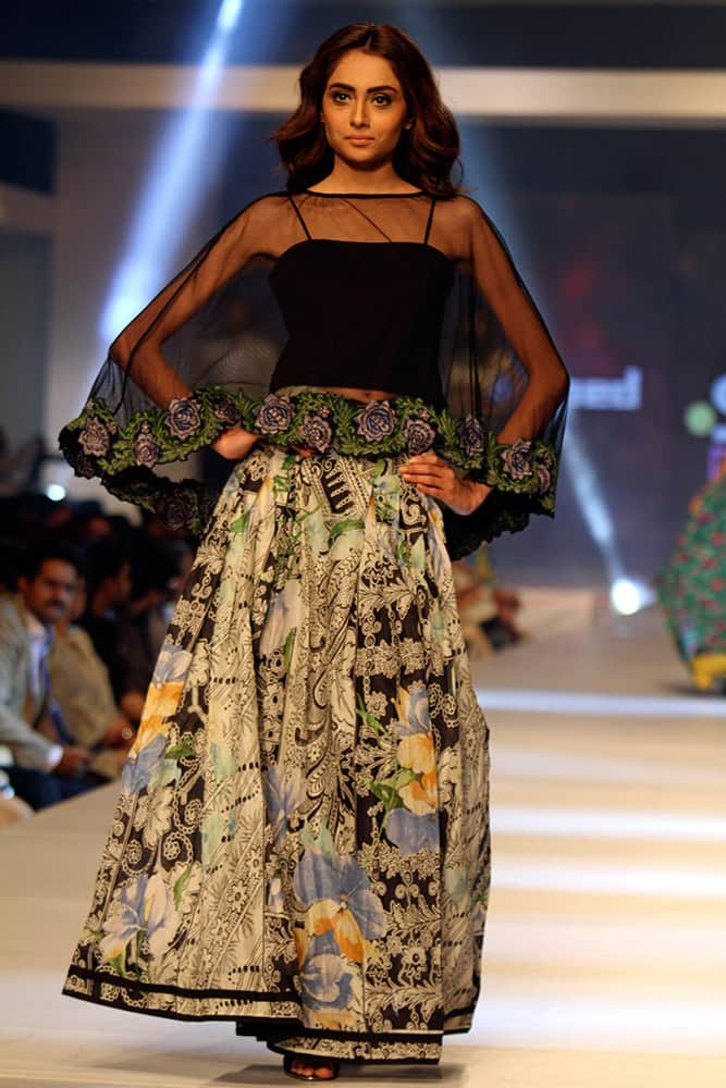 A model presents a creation by Pakistani designer Gul Ahmed on the third-day of PFDC Sunsilk Fashion Week Spring/Summer 2015 in Lahore, Pakistan.