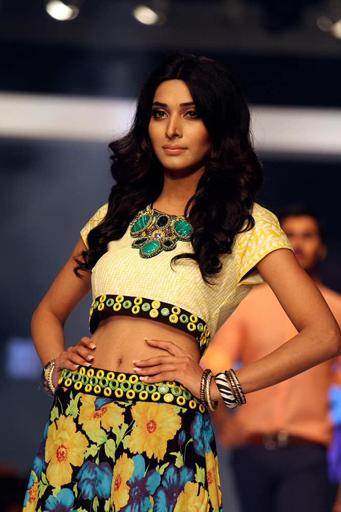 A model presents a creation by Pakistani designer Gul Ahmed on the third-day of PFDC Sunsilk Fashion Week Spring/Summer 2015, in Lahore, Pakistan.