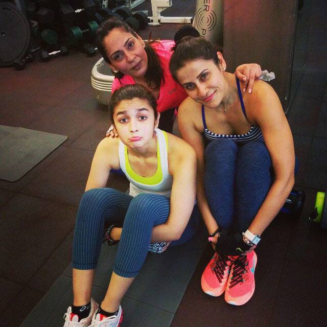 Alia Bhatt :- Post cross fit expression with @yasminbodyimage & reshamlalwani27 #cantwalk #cantmove… -instagram