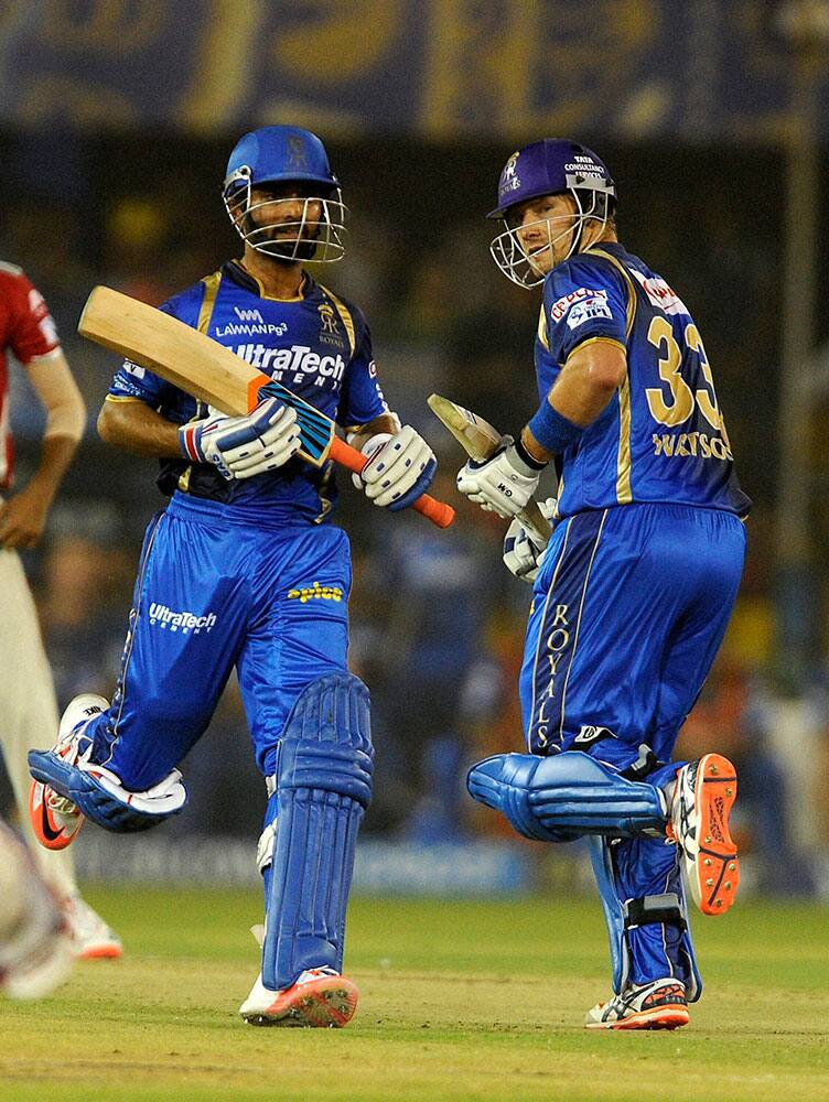 Shane Watson captain of Rajasthan Royals and Ajinkya Rahane of Rajasthan Royals run between the wickets during their IPL T20 match against Kings XI Punjab at the Sardar Patel Stadium in Ahmedabad.