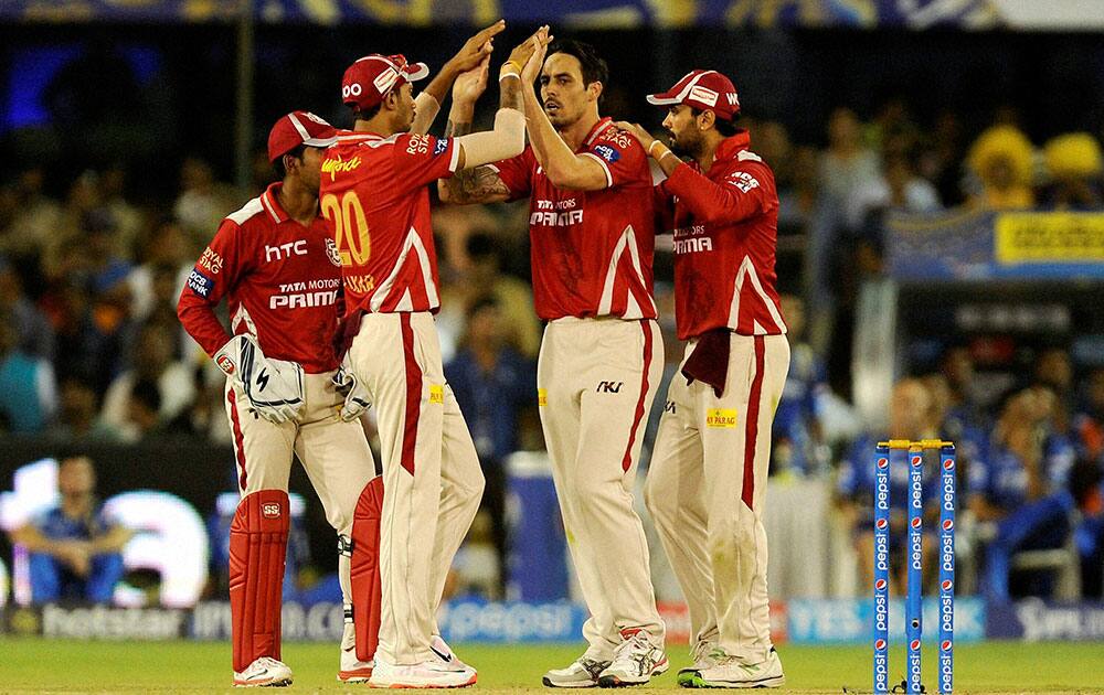 Mitchell Johnson of Kings XI Punjab celebrates the wicket of Ajinkya Rahane of Rajasthan Royals during their IPL T20 match against Kings XI Punjab at the Sardar Patel Stadium in Ahmedabad.