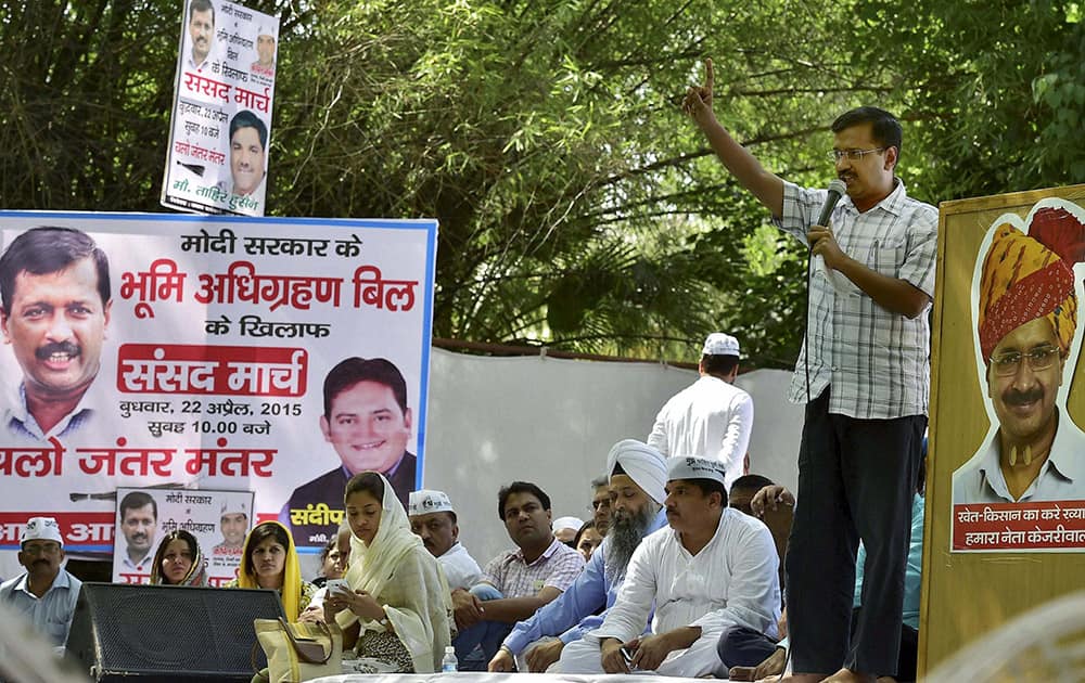 Delhi CM Arvind Kejriwal addresses during Aam Aadmi Party (AAP)s rally against the Union governments Land Acquisition Bill at Jantar Mantar in New Delhi.