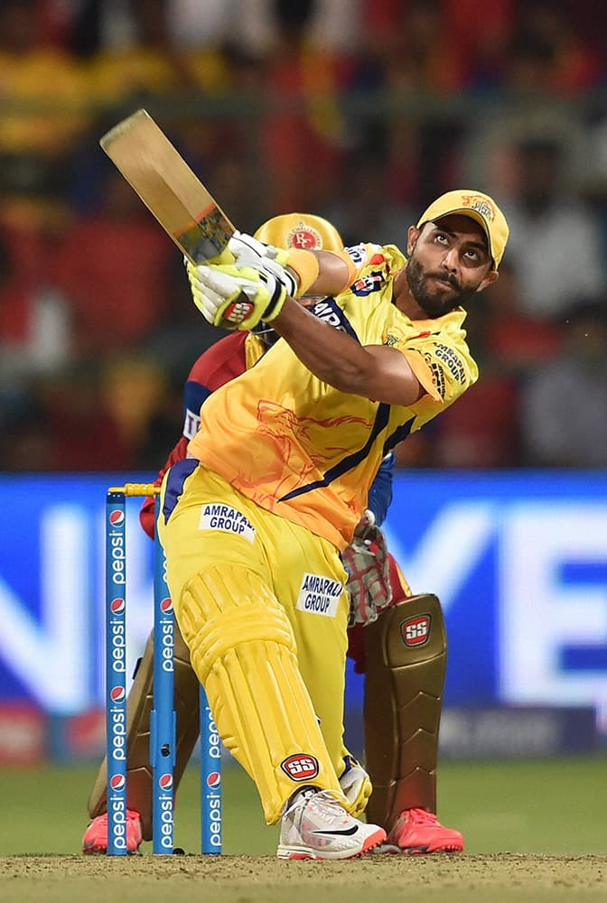 Chennai Super Kings Ravindra Jadeja plays a shot during IPL 8 against Royal Challengers Bangalore match at Bengaluru.