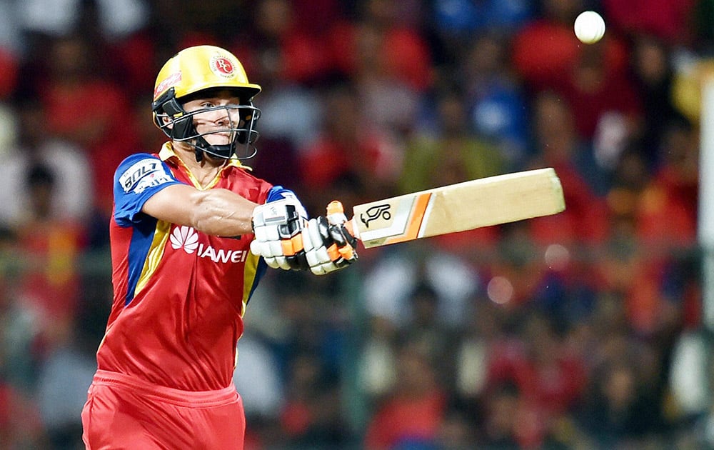 Royal Challengers Bangalore Rilee Rossouw plays a shot against Chennai Super Kings during IPL 8 match at Bengaluru.