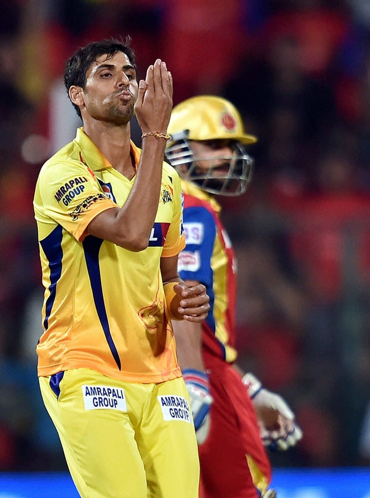 Chennai Super Kings Ashish Nehra celebrates the wicket of Rilee Rossouw during IPL 8 against Royal Challengers Bangalore match at Bengaluru.