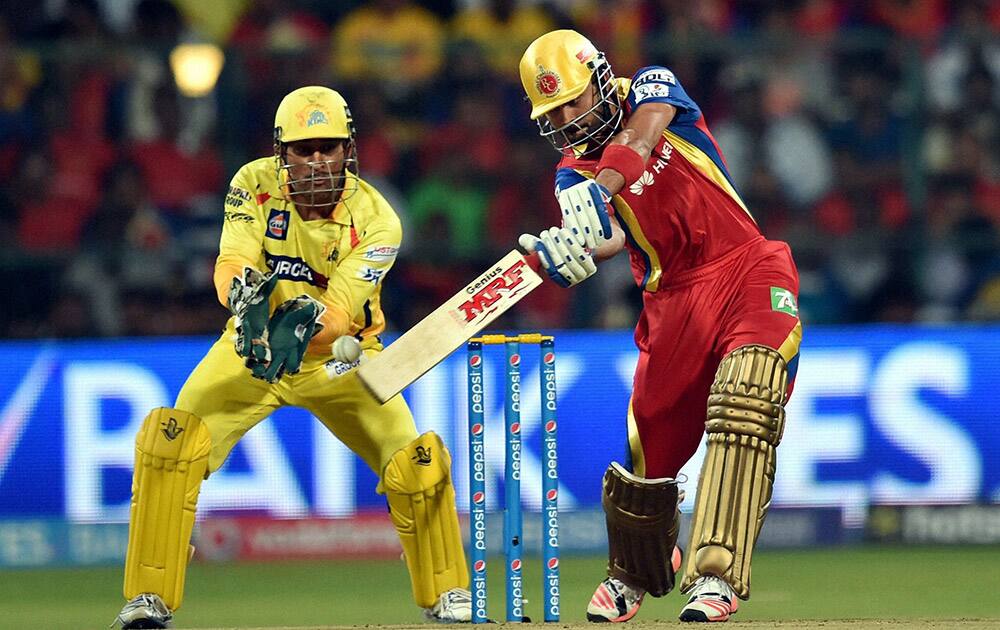 Royal Challengers Bangalore Virat Kohli plays a shot against Chennai Super Kings during IPL 8 match at Bengaluru.