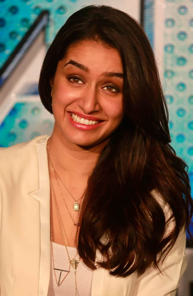 Bollywood actress Shraddha Kapoor smiles as she listens to a question from a journalist during the trailer unveiling of ABCD 2 (Any Body Can Dance 2) in Mumbai.