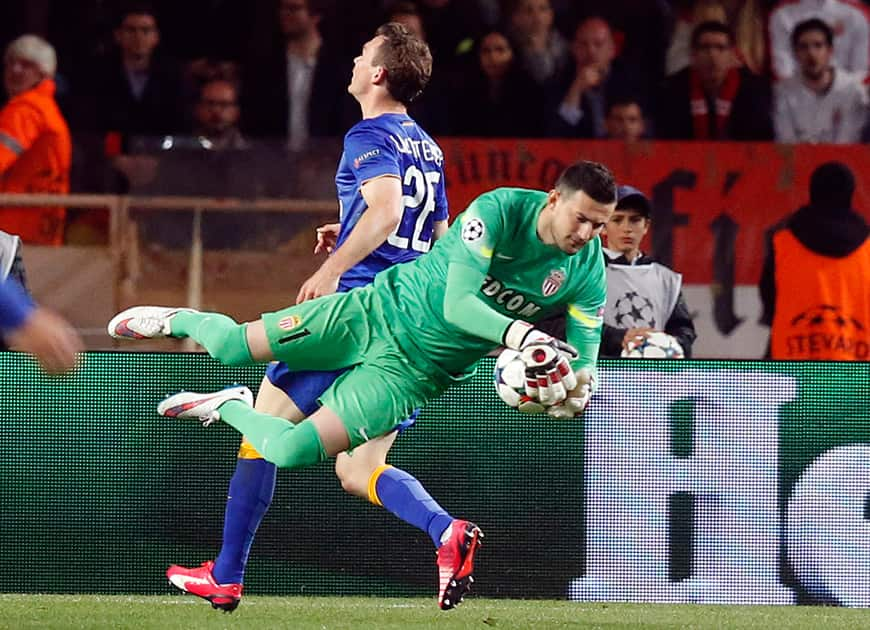 Monaco's goalkeeper Danijel Subasic makes a save during the Champions League quarterfinal second leg soccer match between Monaco and Juventus at Louis II stadium in Monaco.