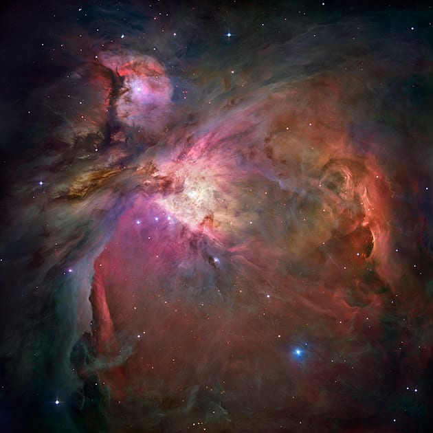This image made by the NASA/ESA Hubble Space Telescope shows the Orion Nebula and the proceess of star formation, from the massive, young stars that are shaping the nebula to the pillars of dense gas that may be the homes of budding stars. The Hubble Space Telescope marks its 25th anniversary.
