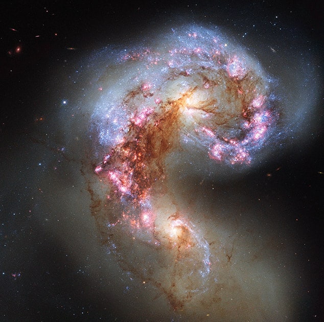 This image made by the NASA/ESA Hubble Space Telescope shows NGC 4038 and NGC 4039, known as the Antennae Galaxies.