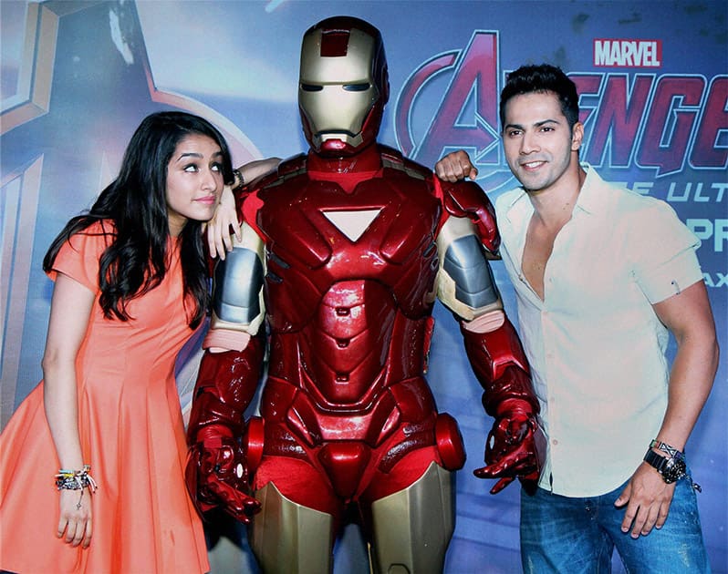 Bollywood actors Shraddha Kapoor and Varun Dhawan pose for a photo during the special screening of Hollywood film Avengers: Age of Ultron in Mumbai.