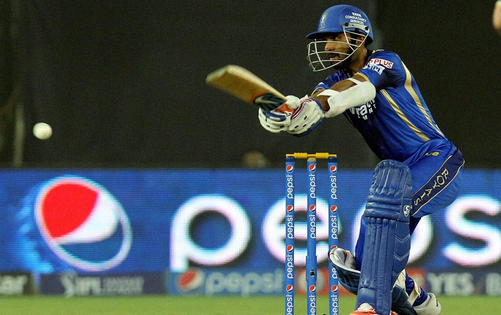 Ajinkya Rahane of Rajasthan Royals plays a shot during an IPL match against Royal Challengers Bangalore in Ahmedabad.