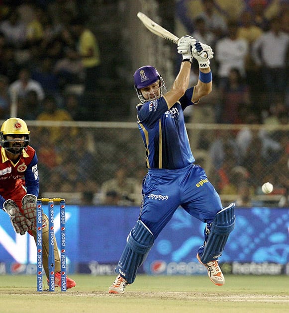 Rajasthan Royals captain Shane Watson plays a shot during an IPL match against Royal Challengers Bangalore in Ahmedabad.