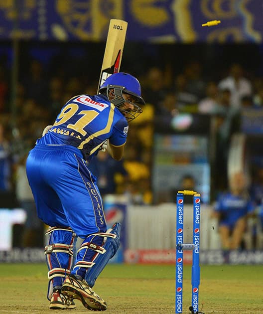 Rajsthan Royals batsman Kulkarni being bowled during an IPL match against Royal Challengers Bangalore in Ahmedabad.