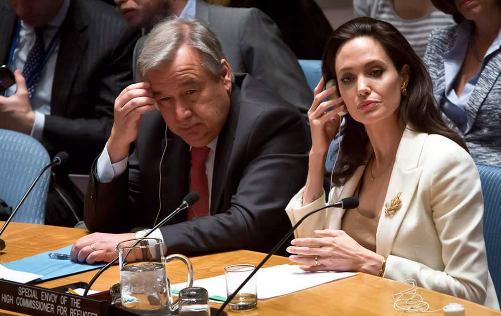 U.N. Special Envoy for Refugees and Hollywood star Angelina Jolie, right, and U.N. High Commissioner for Refugees António Guterres, left, brief the U.N. Security Council on Syria's refugee crisis.