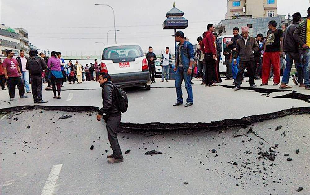 A damaged road after a powerful earthquake in Kathmandu.