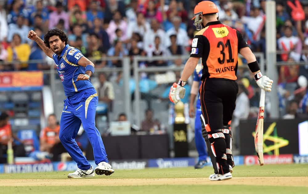 Mumbai IndiansLasith Malinga celebrates after dismissing David Warner of Sunrisers Hyderabad during the IPL match in Mumbai.