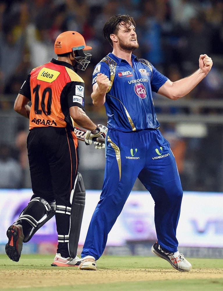 Mumbai Indians player Mitchell McLanagan celebrates the wicket of Ravi Bopara of SRH during the IPL match in Mumbai.