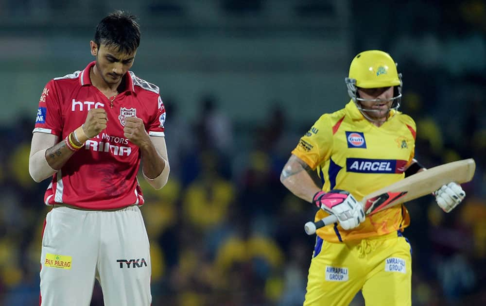 Kings XI Punjab player Axar Patel celebrating for a wicket of Chennai Super Kings player Brendon McCullum during the IPL-2015 match at MAC Stadium in Chennai.