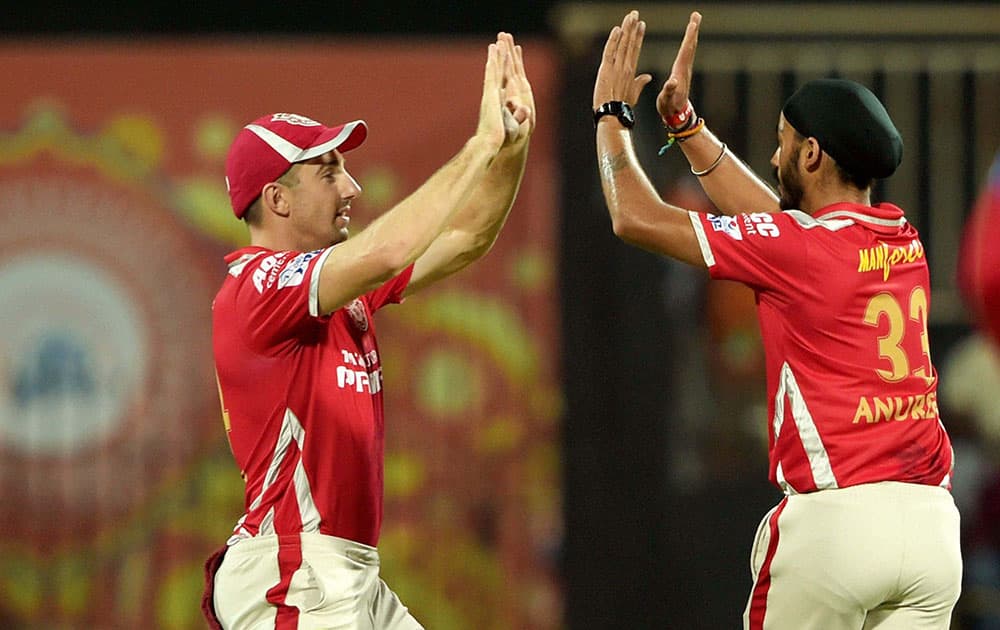 Kings XI Punjab player Anureet Singh celebrating a wicket of Chennai Super Kings player D Smith during the IPL-2015 match at MAC Stadium in Chennai.