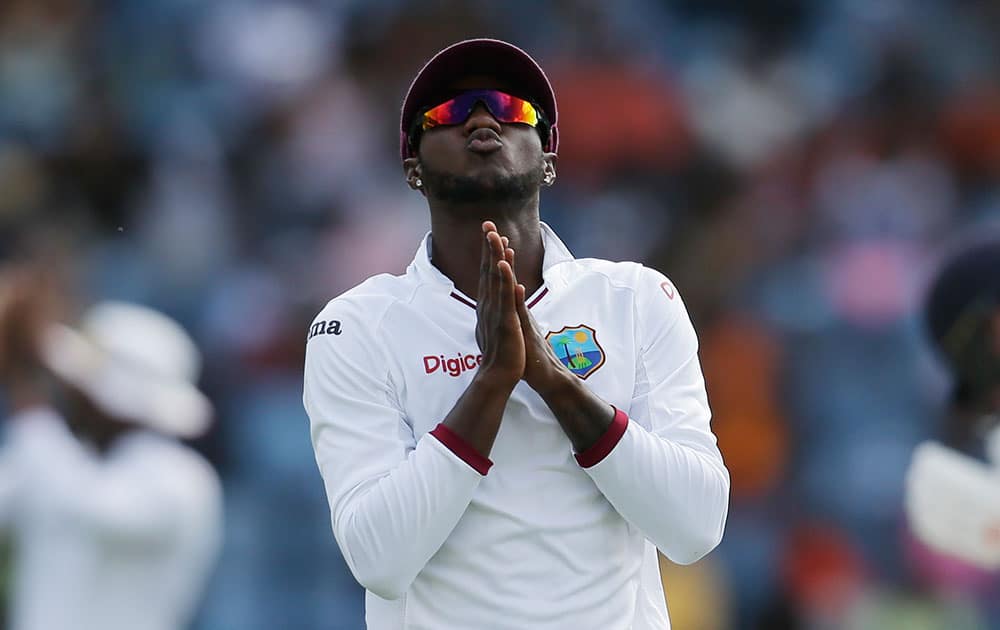 West Indies' Kraigg Brathwaite reacts to failing to dismiss England captain Alistair Cook during day five of their second Test match at the National Stadium in St. George's, Grenada.