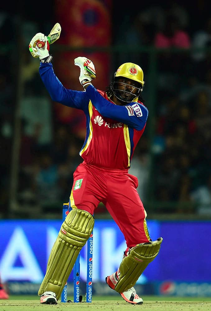 Royal Challengers Bangalores Chris Gayle plays a shot against Delhi Daredevils during an IPL match at Feroz Shah Kotla Stadium in New Delhi.