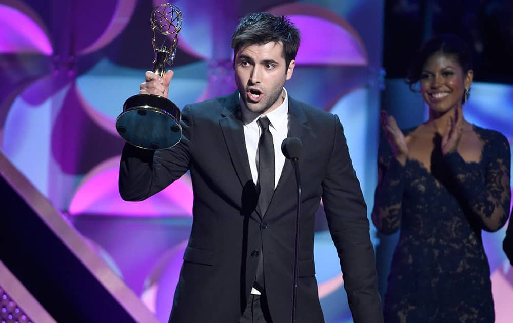 Freddie Smith accepts the award for outstanding younger actor in a drama series at the 42nd annual Daytime Emmy Awards at Warner Bros. Studios .