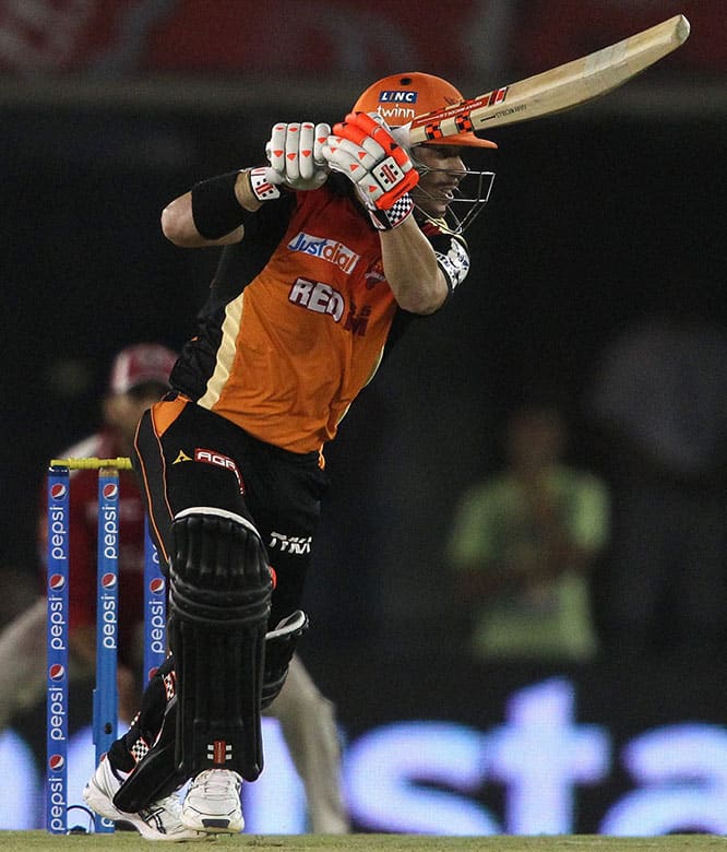 Sunrisers Hyderabads David Warner plays a shot during an IPL match against Kings XI Punjab in Mohali.