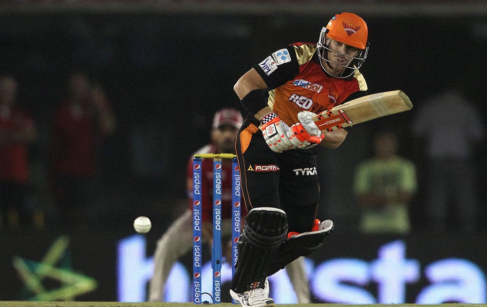 Sunrisers Hyderabads David Warner plays a shot during an IPL match against Kings XI Punjab in Mohali.