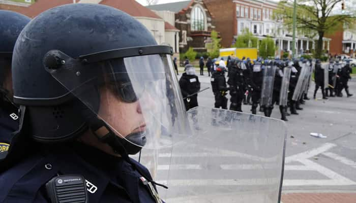 Troops on Baltimore streets after night of chaos