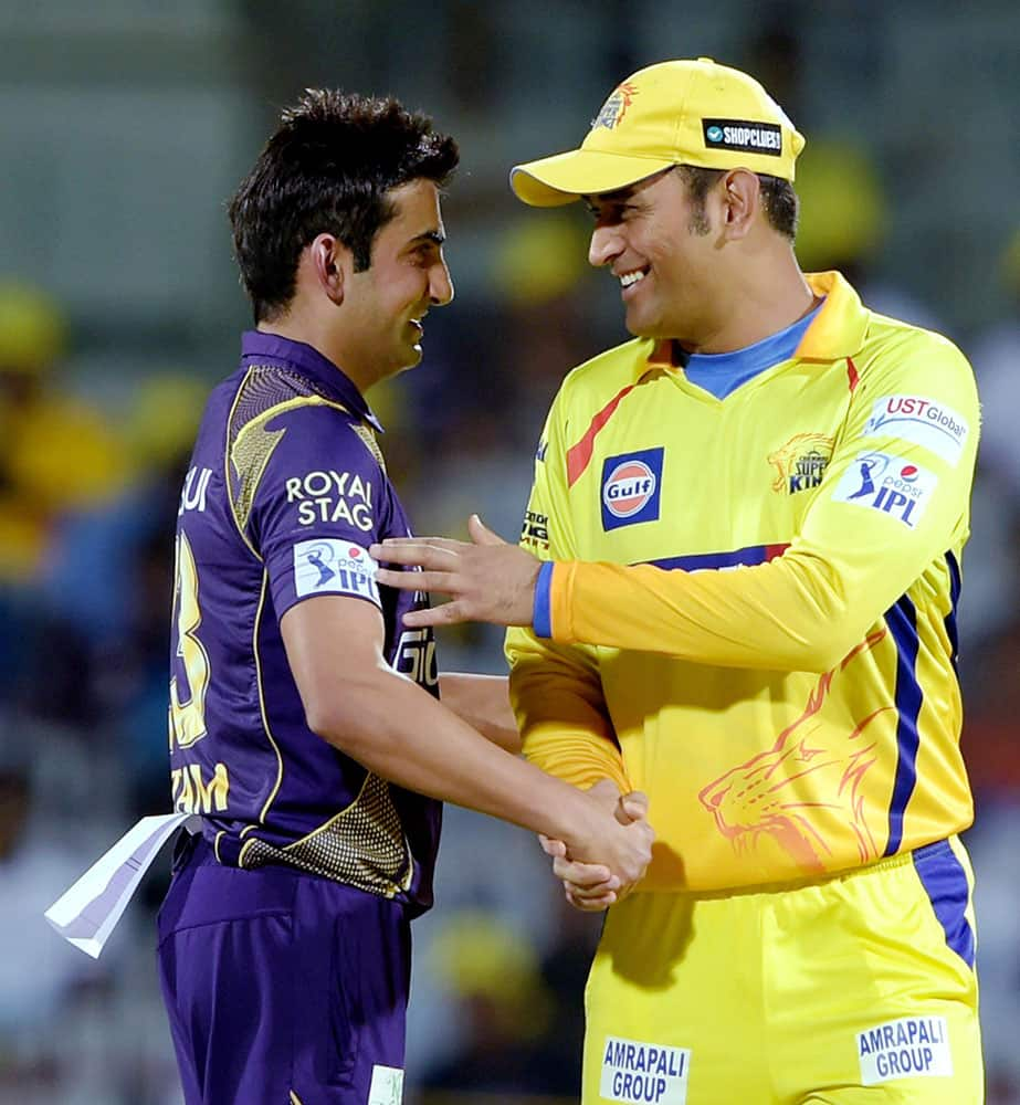 Chennai Super Kings’ Skipper MS Dhoni and Kolkata Knight Riders Skipper Gautam Gambhir during the IPL-2015 match at MAC Stadium in Chennai.