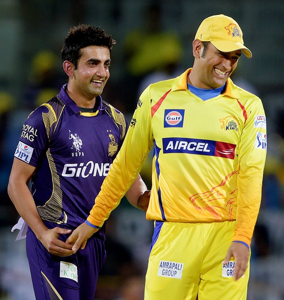 Chennai Super Kings’ Skipper MS Dhoni and Kolkata Knight Riders Skipper Gautam Gambhir during the IPL-2015 match at MAC Stadium in Chennai.