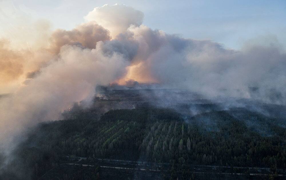 An aerial view of a forest fire in the Chernobyl area, Ukraine, as fire has engulfed a large sector of woods in the exclusion zone around the destroyed Chernobyl nuclear power plant. 