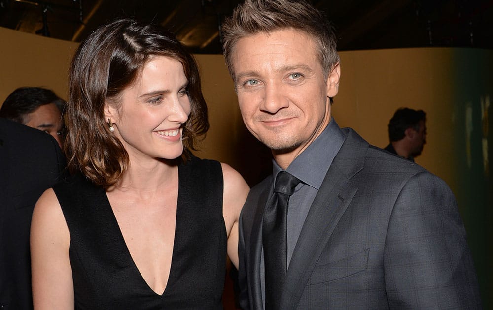 Cobie Smulders, left, and Jeremy Renner arrive at a special screening of Marvel's 