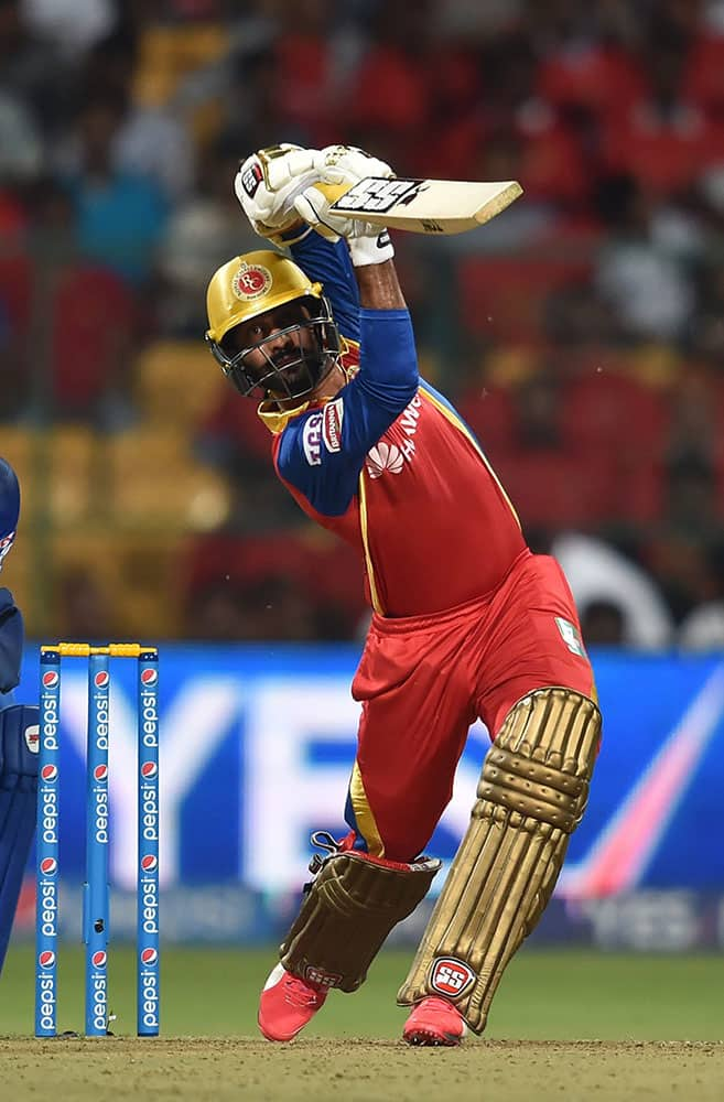 Royal Challengers Bangalore Dinesh Karthick plays a shot during IPL match against Rajasthan Royals in Bengaluru.