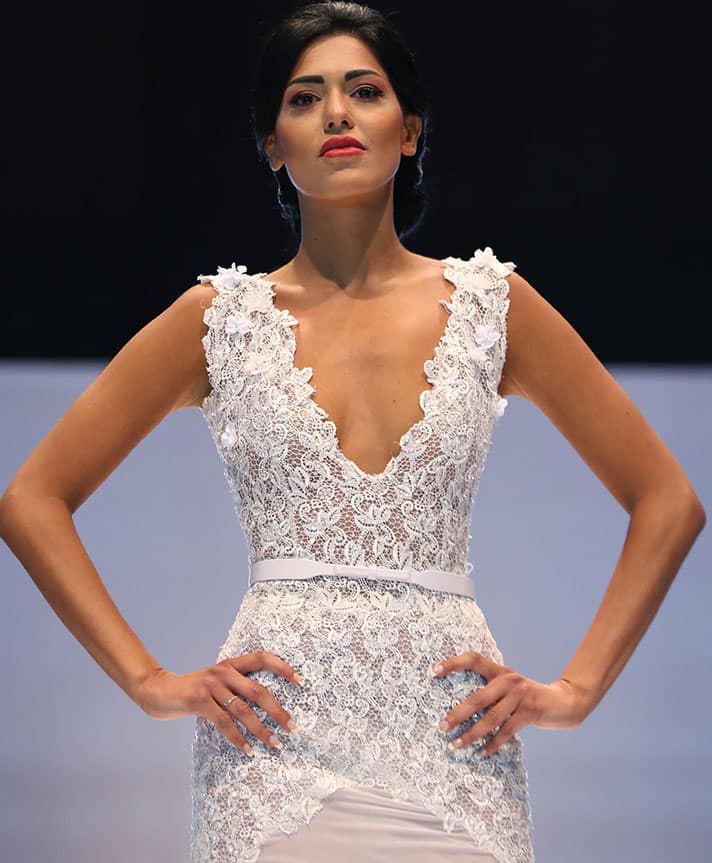 A model displays a creation by Lebanese international designer Abed Mahfouz during his Spring-Summer 2015 fashion show, in Beirut, Lebanon.