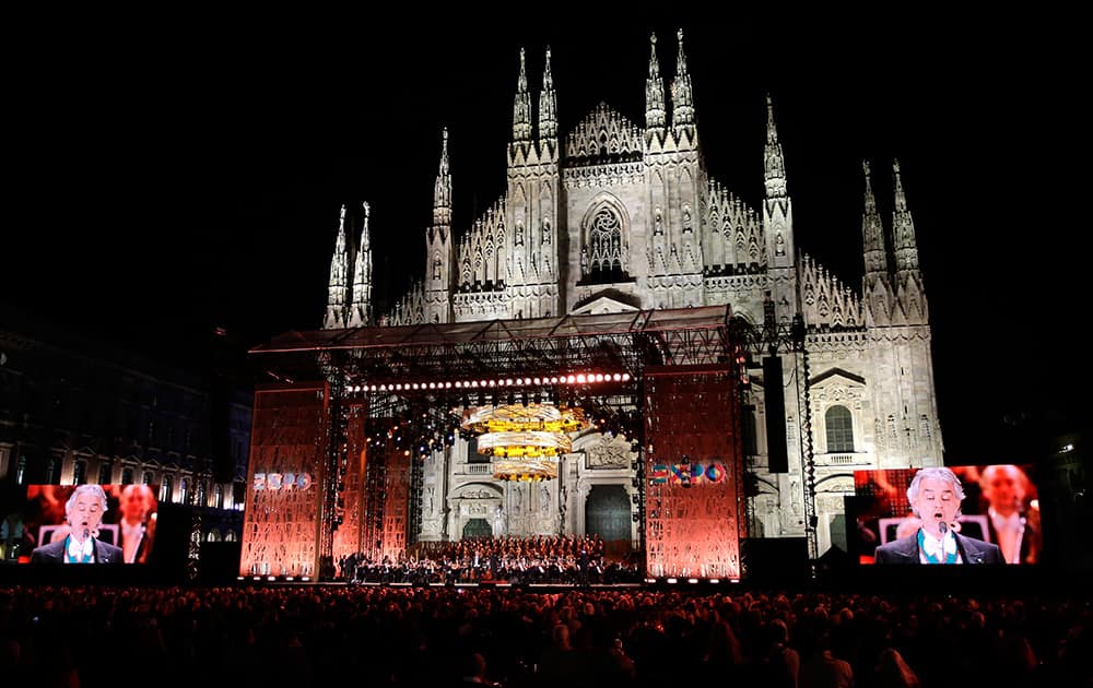 Italian singer Andrea Bocelli performs in front of the Duomo gothic cathedral during the Expo 2015 inaugural concert in Milan, Italy.