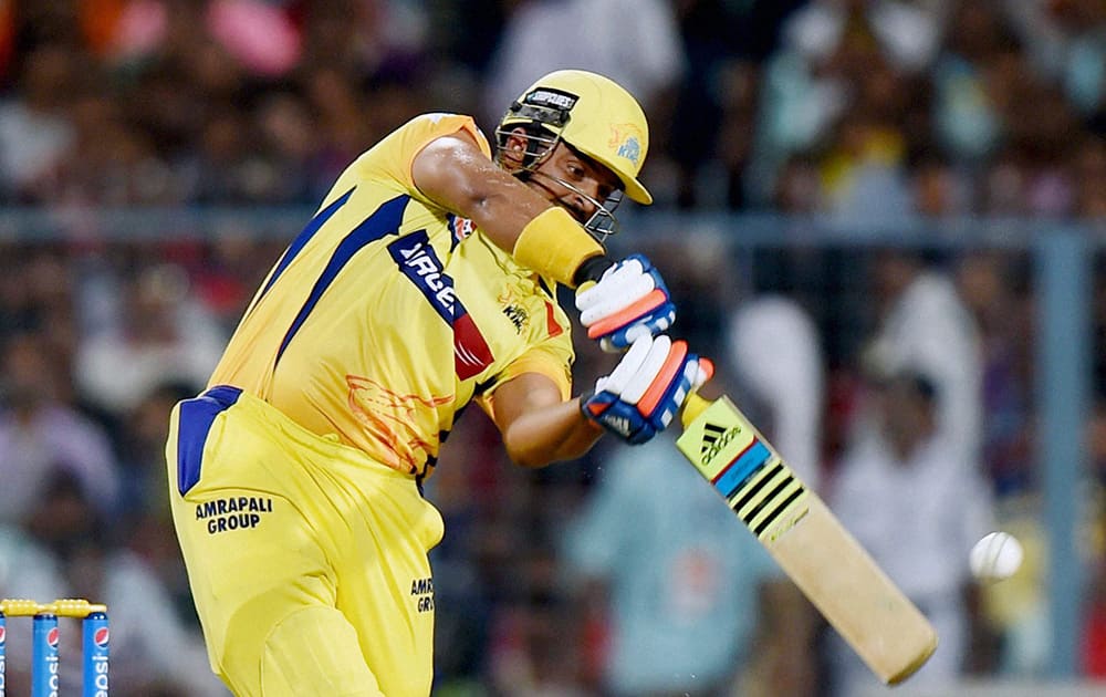 CSK batsman Suresh Raina plays a shot during IPL Match against KKR at Eden Garden in Kolkata.