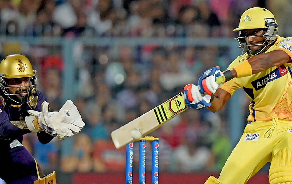 CSK batsman Dwayne Bravo plays a shot during an IPL match against KKR at Eden Garden in Kolkata.