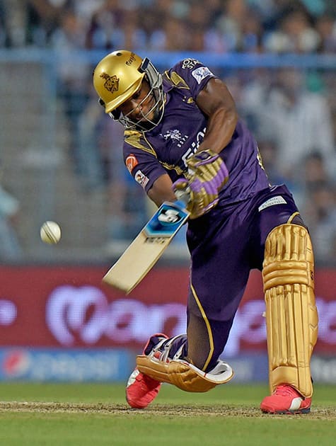 KKR batsman Andre Russell plays a shot during an IPL match against CSK at Eden Garden in Kolkata.