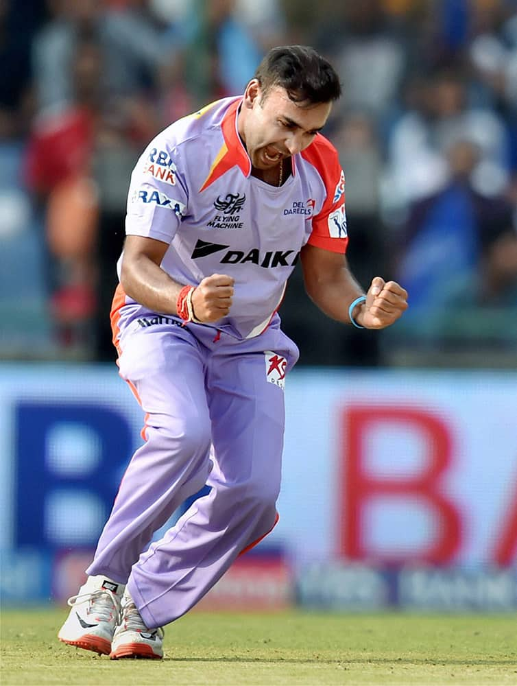 Delhi Daredevils bowler Amit Mishra celebrates after taking wicket of Kings XI Punjabs captain George Bailey during their IPL match in New Delhi.