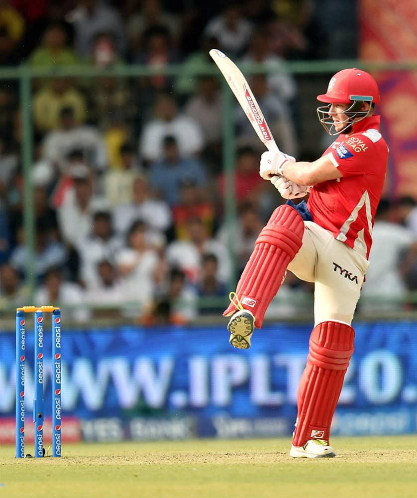 Kings XI Punjabs batsman David Miller plays a shot against Delhi Daredevils during their IPL match in New Delhi.