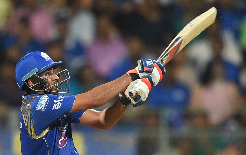 Mumbai Indians batsman Rohit Sharma plays a shot during an IPL match against Rajasthan Royals in Mumbai.