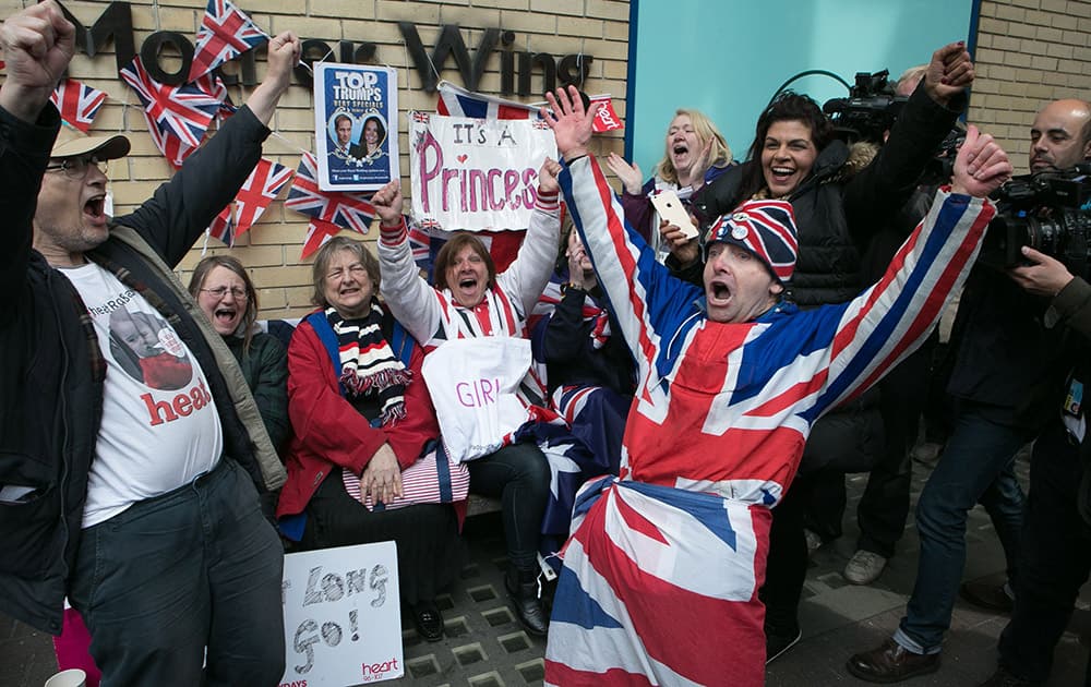 Royal fans and well wishers react after Kensington Palace announced that Kate, the Duchess of Cambridge, had given birth to a girl, outside the Lindo Wing of St. Mary's Hospital, London.