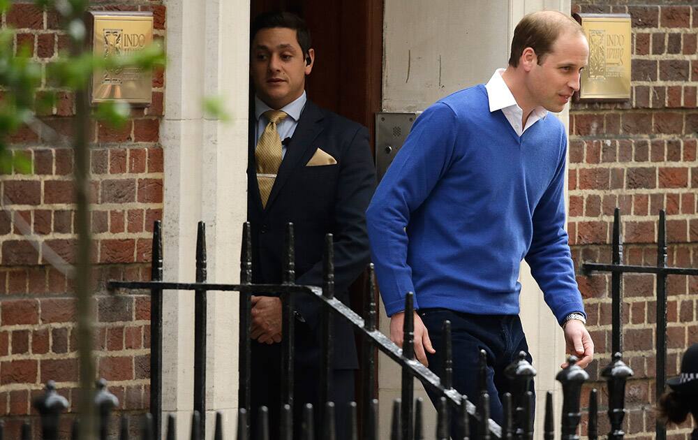 Britain's Prince William leaves St. Mary's Hospital's exclusive Lindo Wing, London. William's wife, Kate, the Duchess of Cambridge, gave birth to a baby girl on Saturday morning.