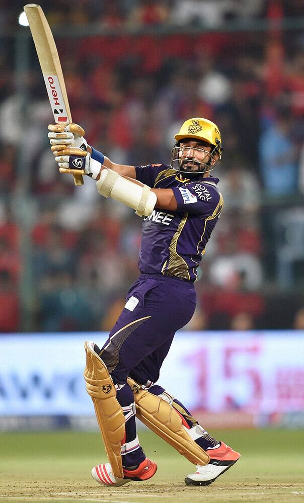 Kolkata Knight Riders Robin Uthappa plays a shot during IPL 8 match against Royal Challengers Bangalore in Bengaluru.