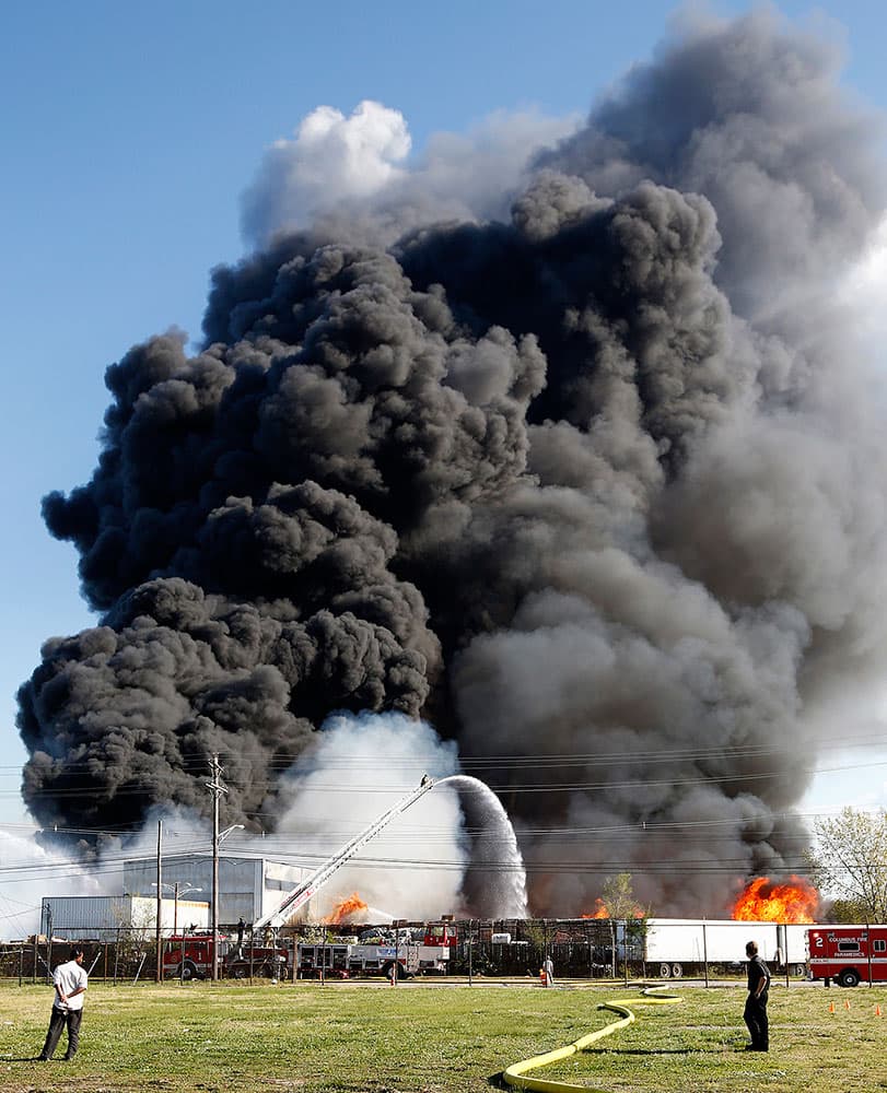 Smoke rises from a fire at a recycling facility in south Columbus, Ohio.