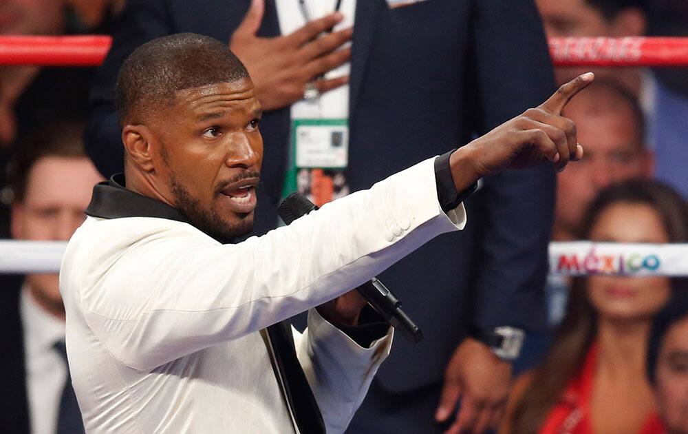 Actor Jamie Foxx sings the national anthem before Floyd Mayweather Jr., and Manny Pacquiao's welterweight title fight in Las Vegas. 